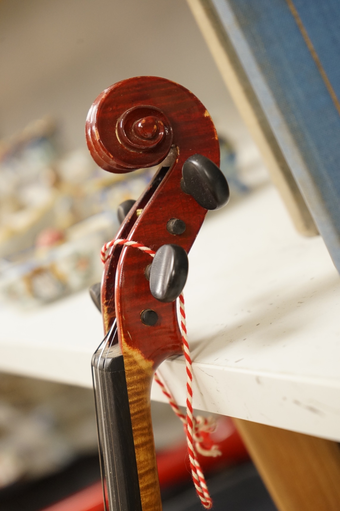 Three musical instruments to include a Buffet flute and violin with two bows